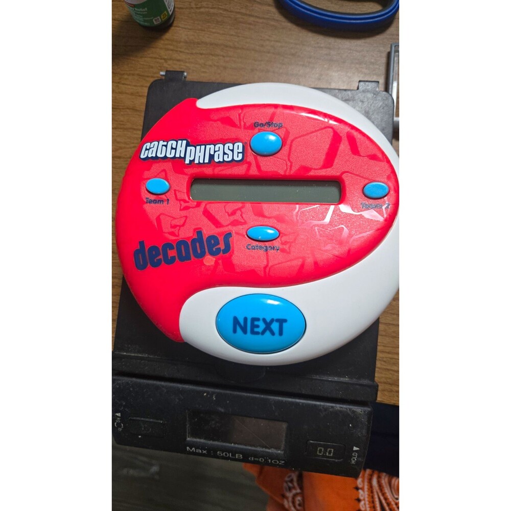 Hasbro Catch Phrase " Decades" Decoder Handheld Electronic Game 2013